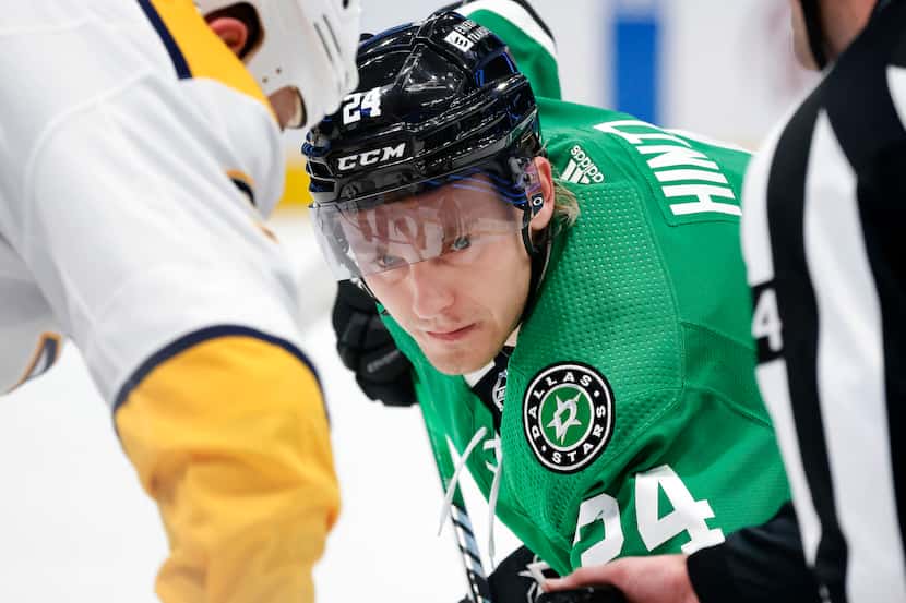Dallas Stars center Roope Hintz (24) eyes the puck during a first period face-off with the...