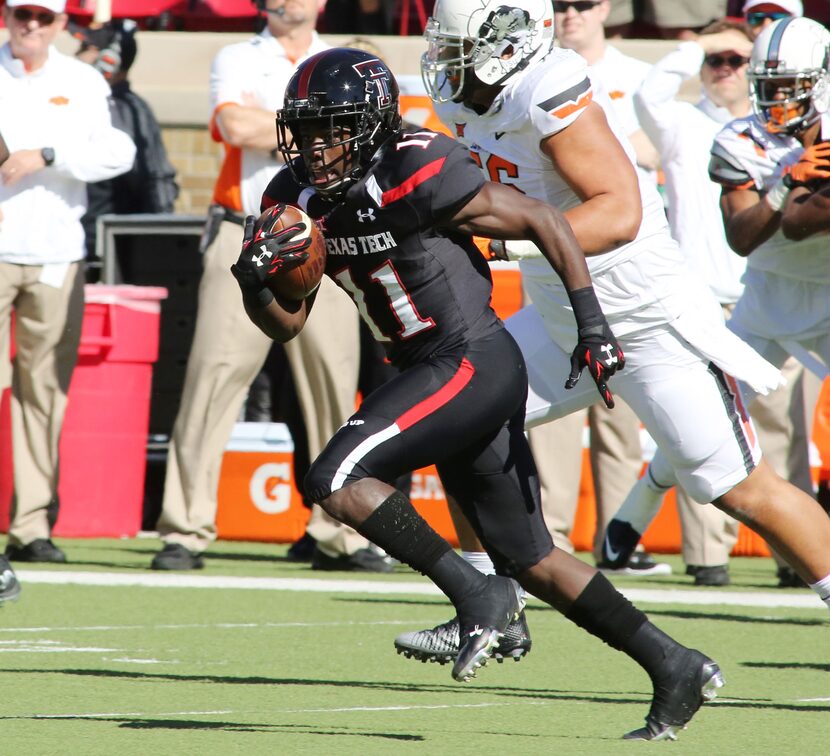 Texas Tech Red Raiders running back Jakeem Grant (11) returns a kickoff for a touchdown...