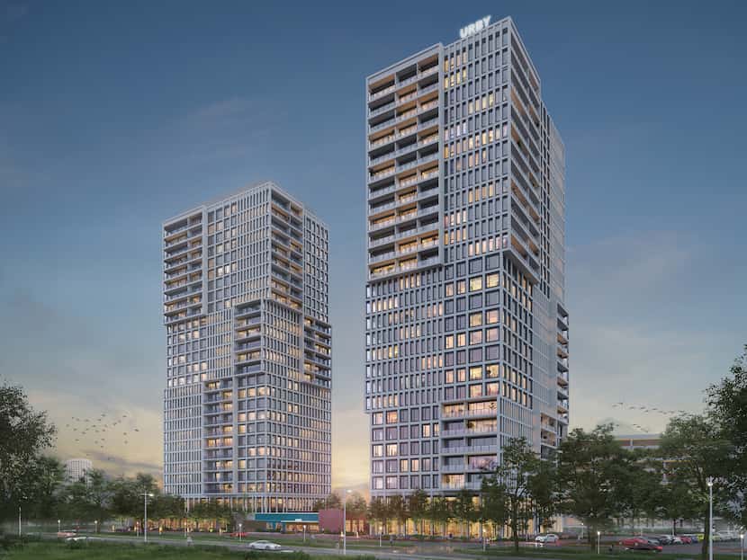 The 28-story tower that started construction is one of three planned for the site near...