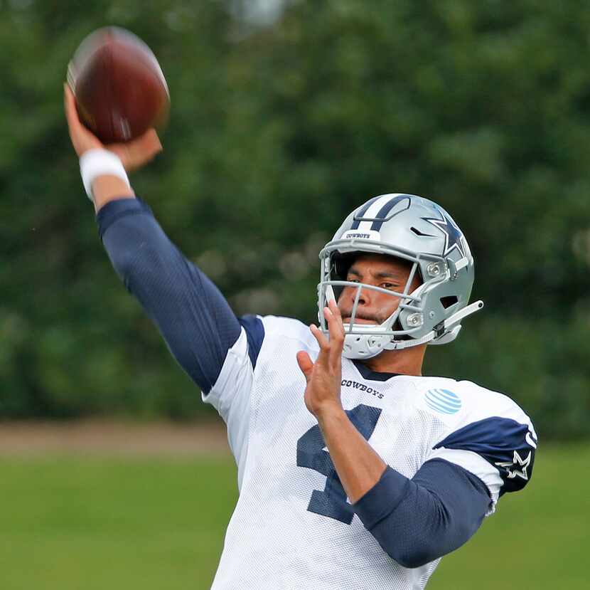 Dallas Cowboys quarterback Dak Prescott (4) throws a pass during practice at The Star in...