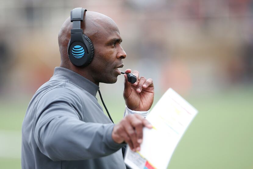 Texas coach Charlie Strong yells out a play call during an NCAA college football game...