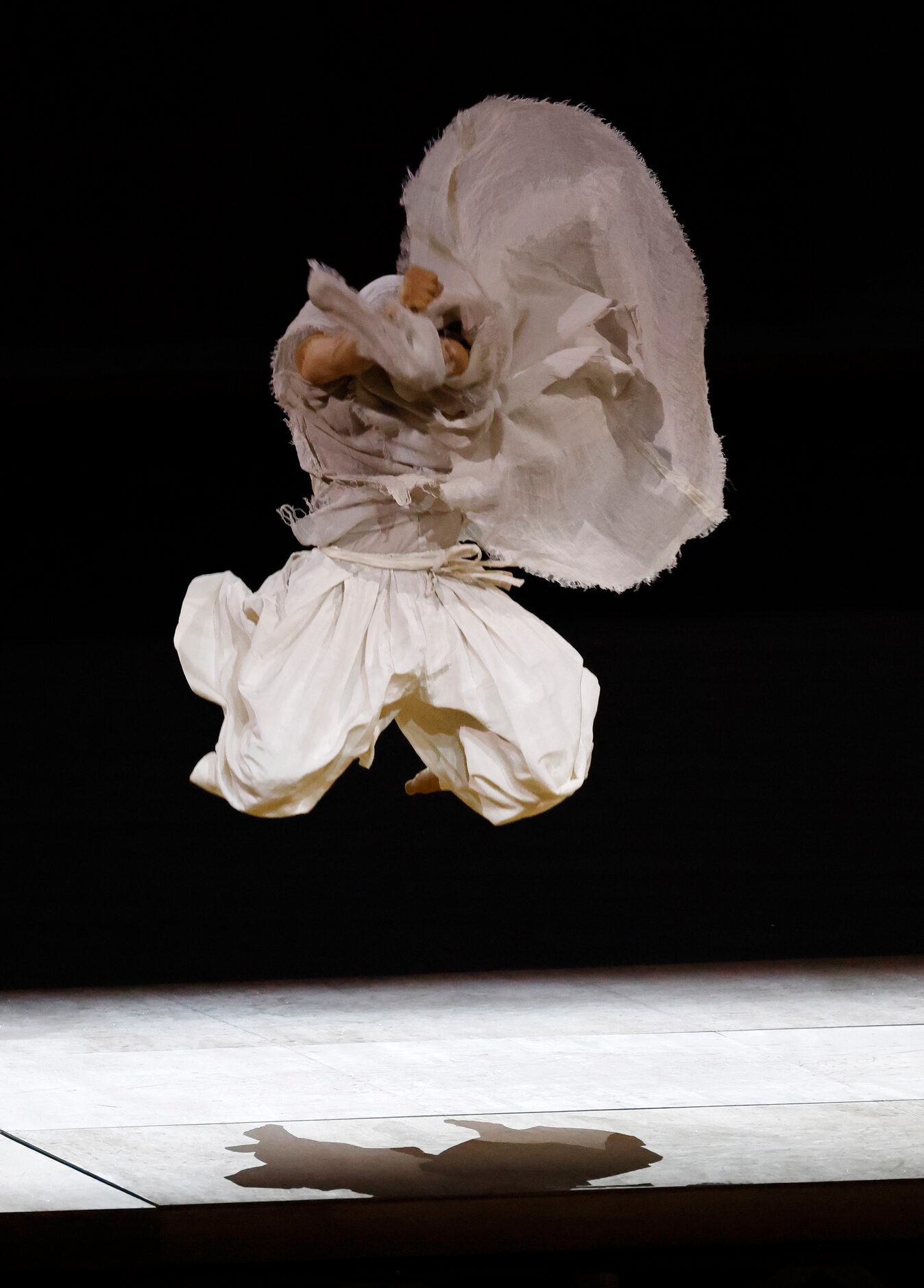 A dancer performs during the opening ceremony for the postponed 2020 Tokyo Olympics at...