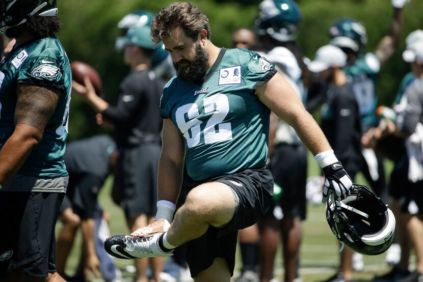 Philadelphia Eagles center Jason Kelce stretches at the NFL football team's practice...