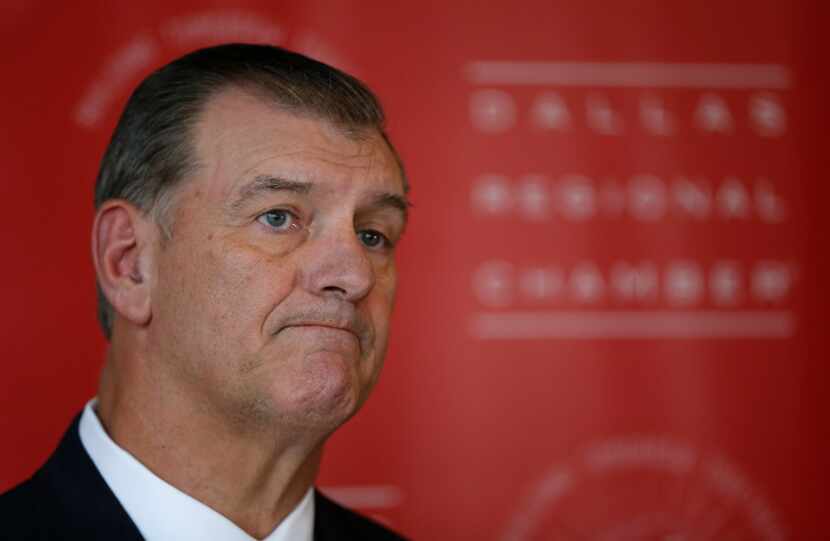 Dallas Mayor Mike Rawlings pauses while speaking during a press conference after the State...