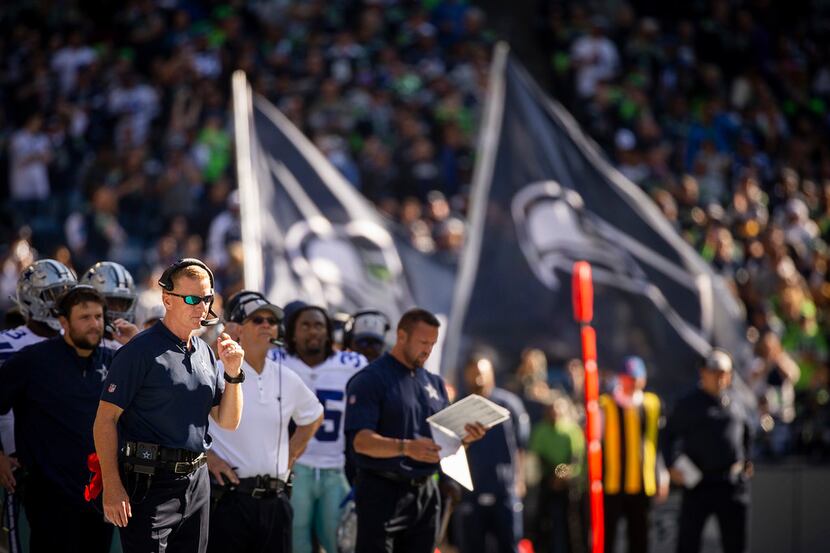 Dallas Cowboys head coach Jason Garrett watches from the sidelines after a Seattle Seahawks...
