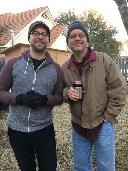 Walter Wilcox and his son, Brad, smoking homemade sausage.