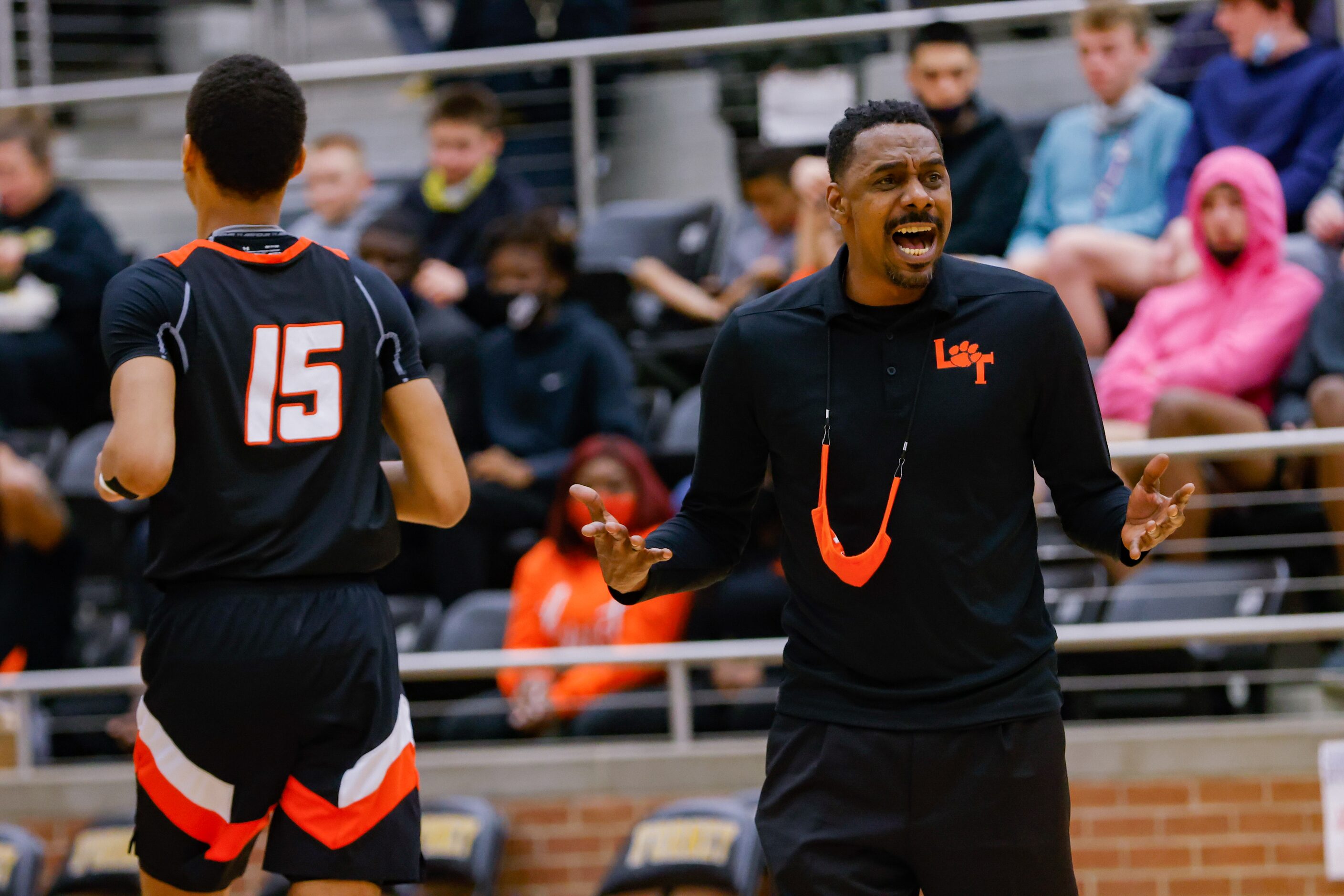 Lancaster's coach Ferrin Douglas during the first half of a boys basketball UIL Class 5A...