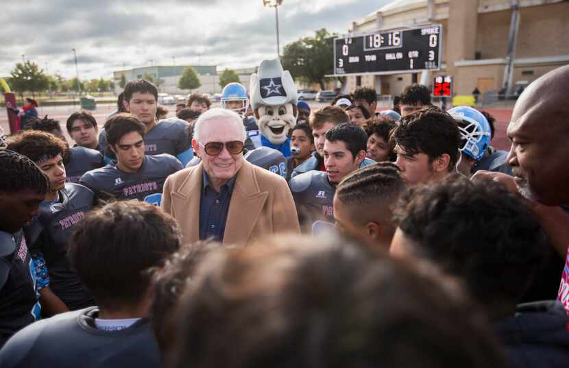 Dallas Cowboys Owner Jerry Jones talked with players before Thomas Jefferson High School...
