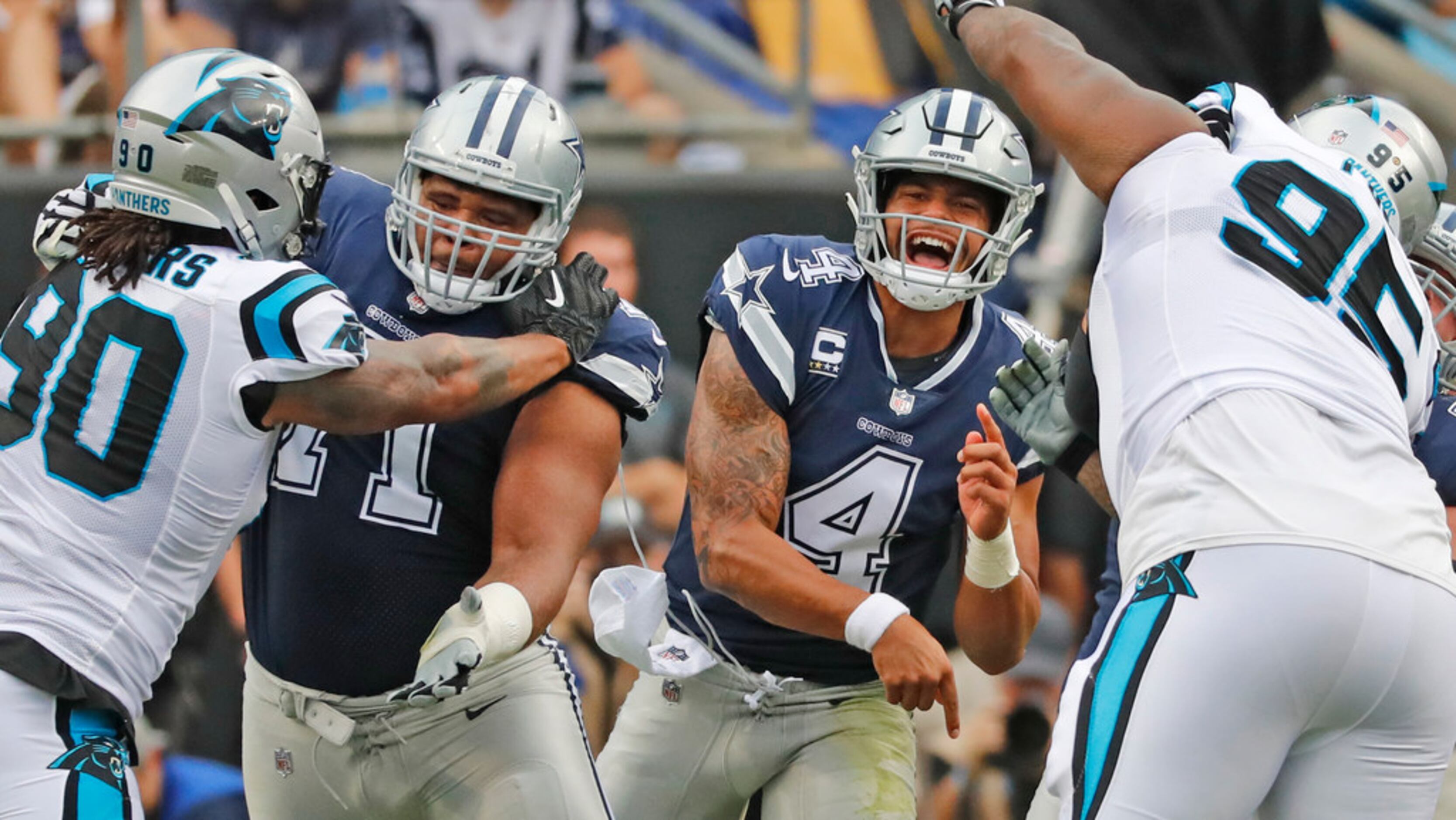 Dallas Cowboys quarterback Dak Prescott dots toe-tapping wide receiver Michael  Gallup for 23-yard pickup