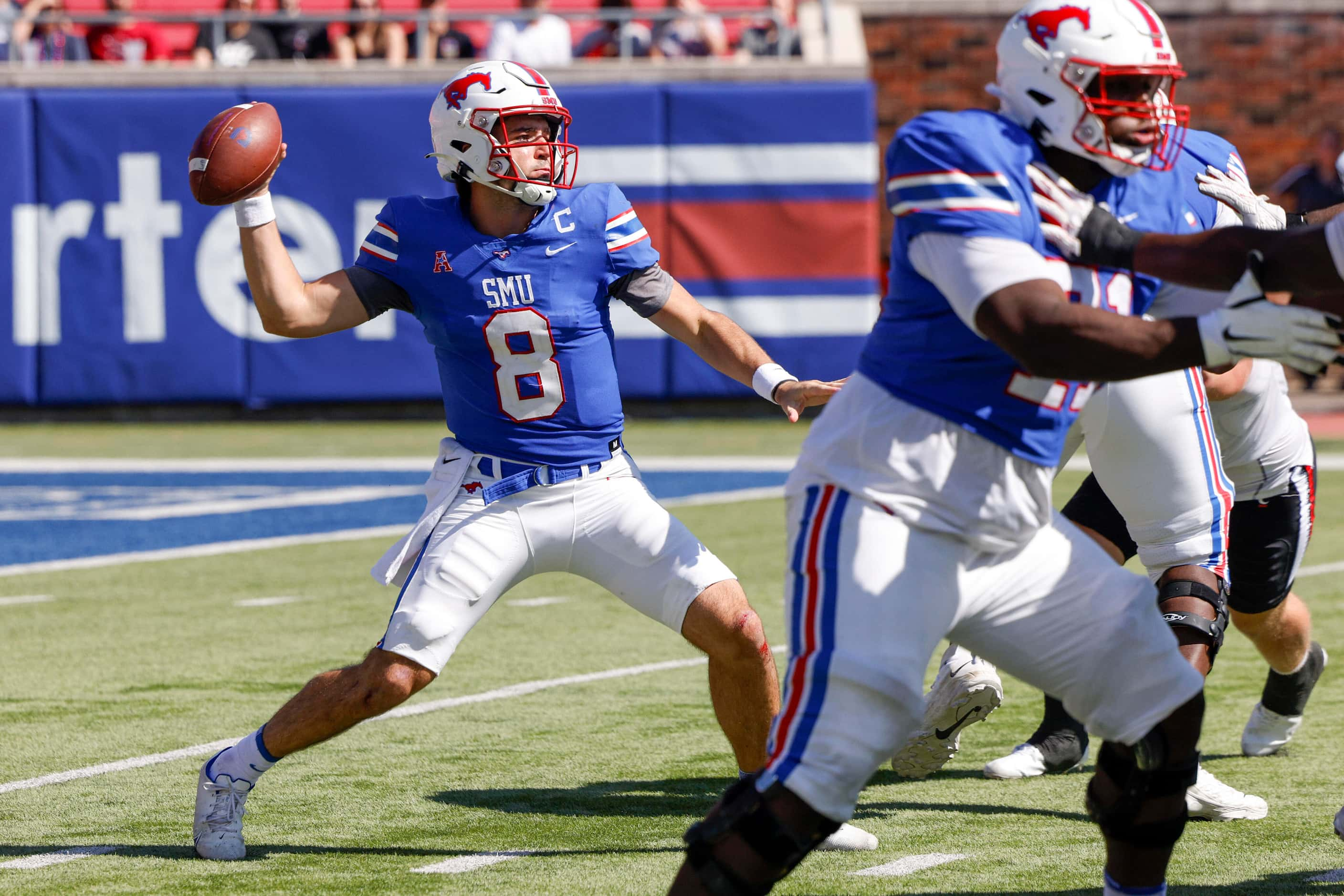 SMU quarterback Tanner Mordecai (8) throws a pass during the second half of an NCAA football...