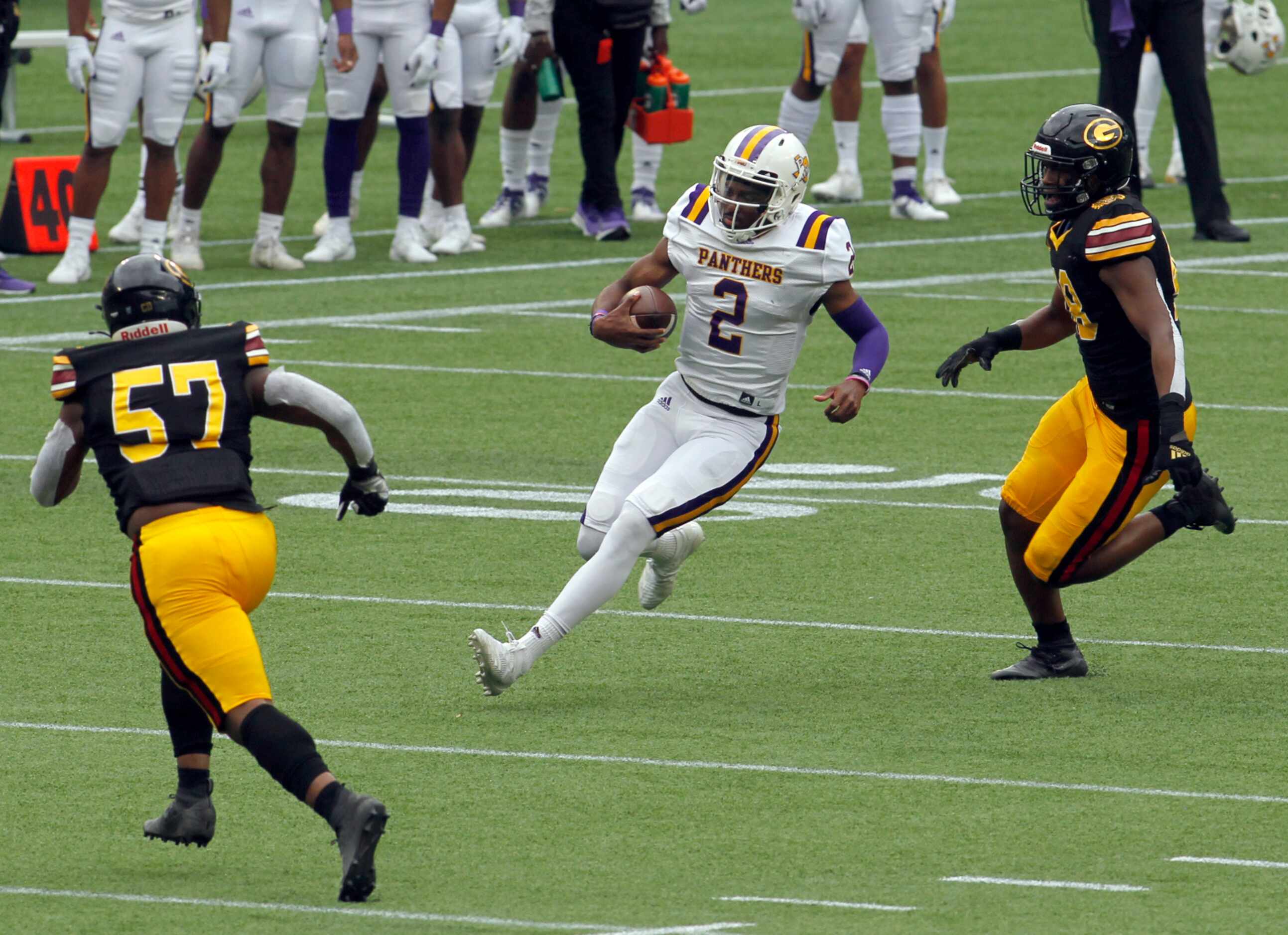 Prairie View quarterback Tyriek Starks (2) scampers into the Grambling State secondary as...