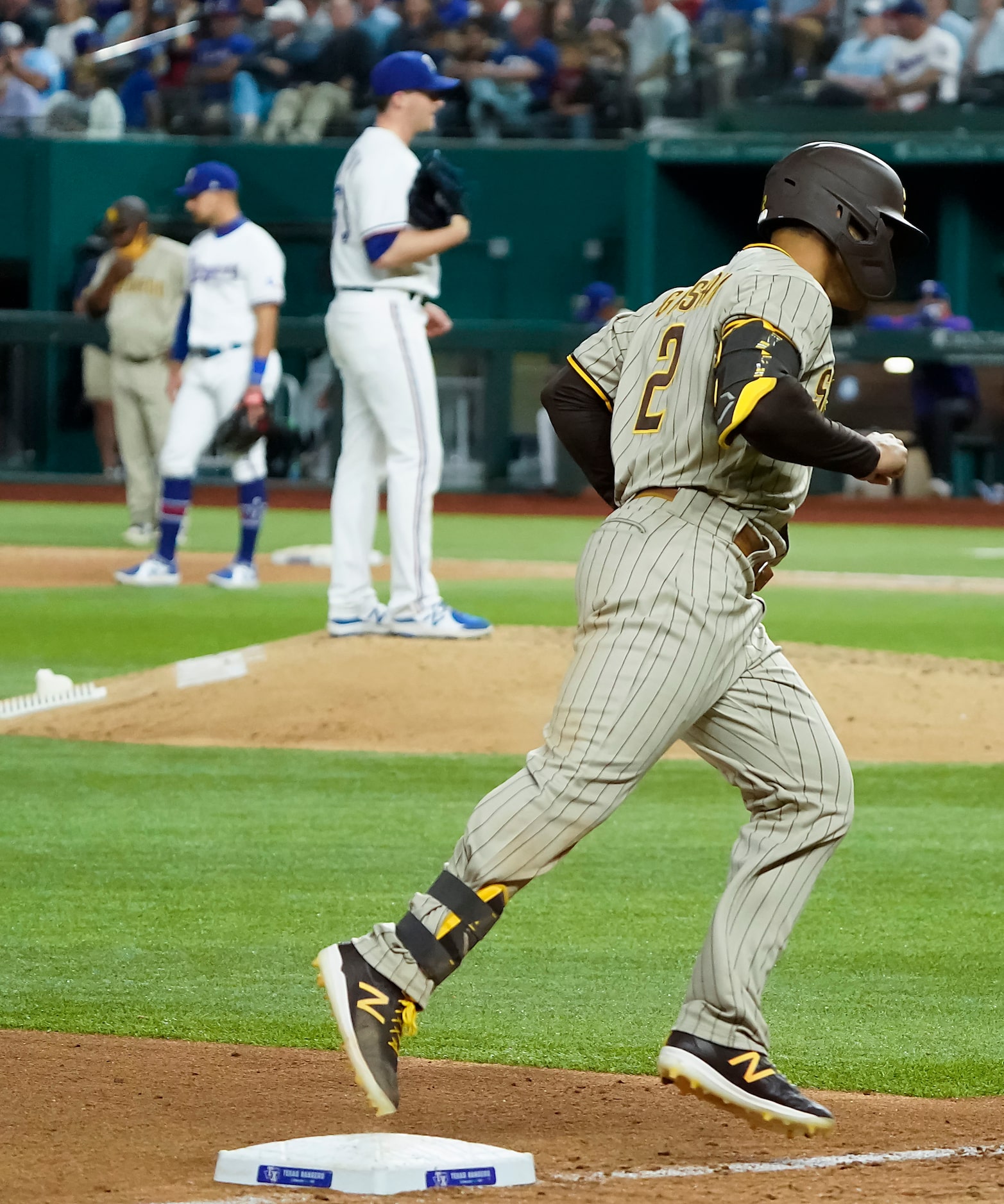 San Diego Padres center fielder Trent Grisham rounds the bases after hitting a 2-run home...