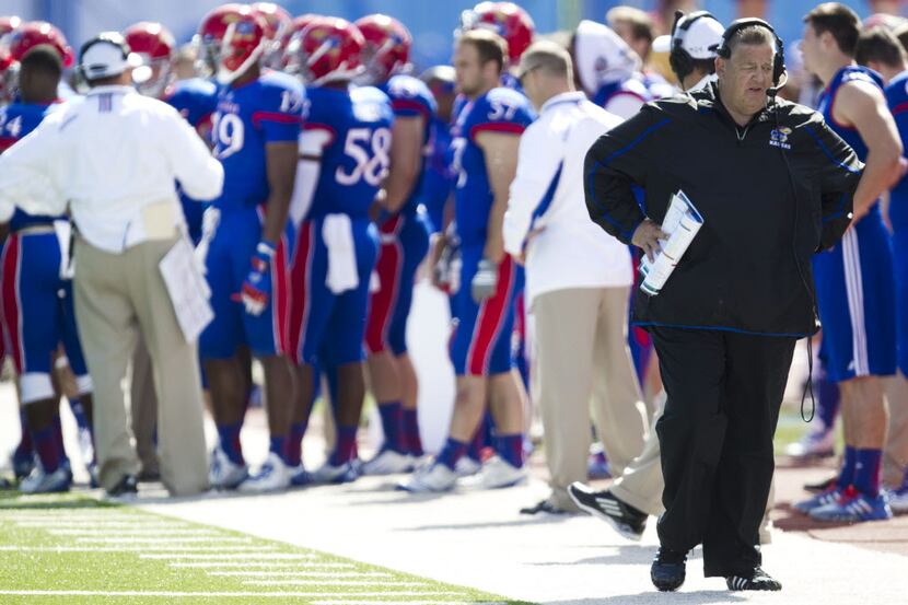Kansas head coach Charlie Weis elected to run a fake punt from inside his own 20 yard line...