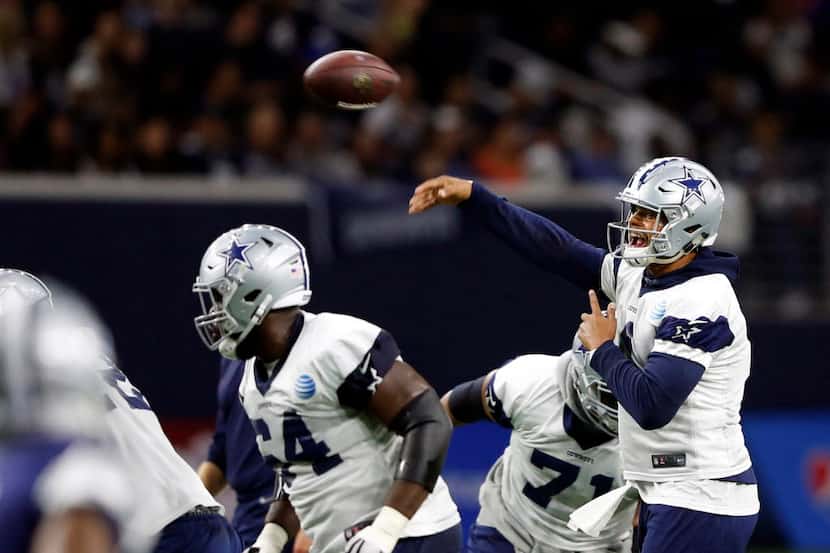 Dallas Cowboys quarterback Dak Prescott (4) attempts a pass during practice on the last day...