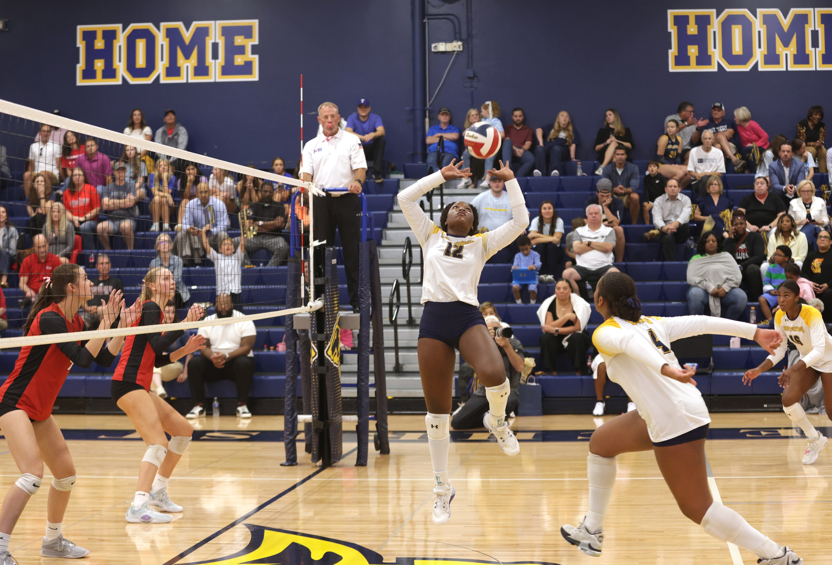 Prestonwood player #12 Taylor Cook jumps for the ball during the Ursuline Academy of Dallas...