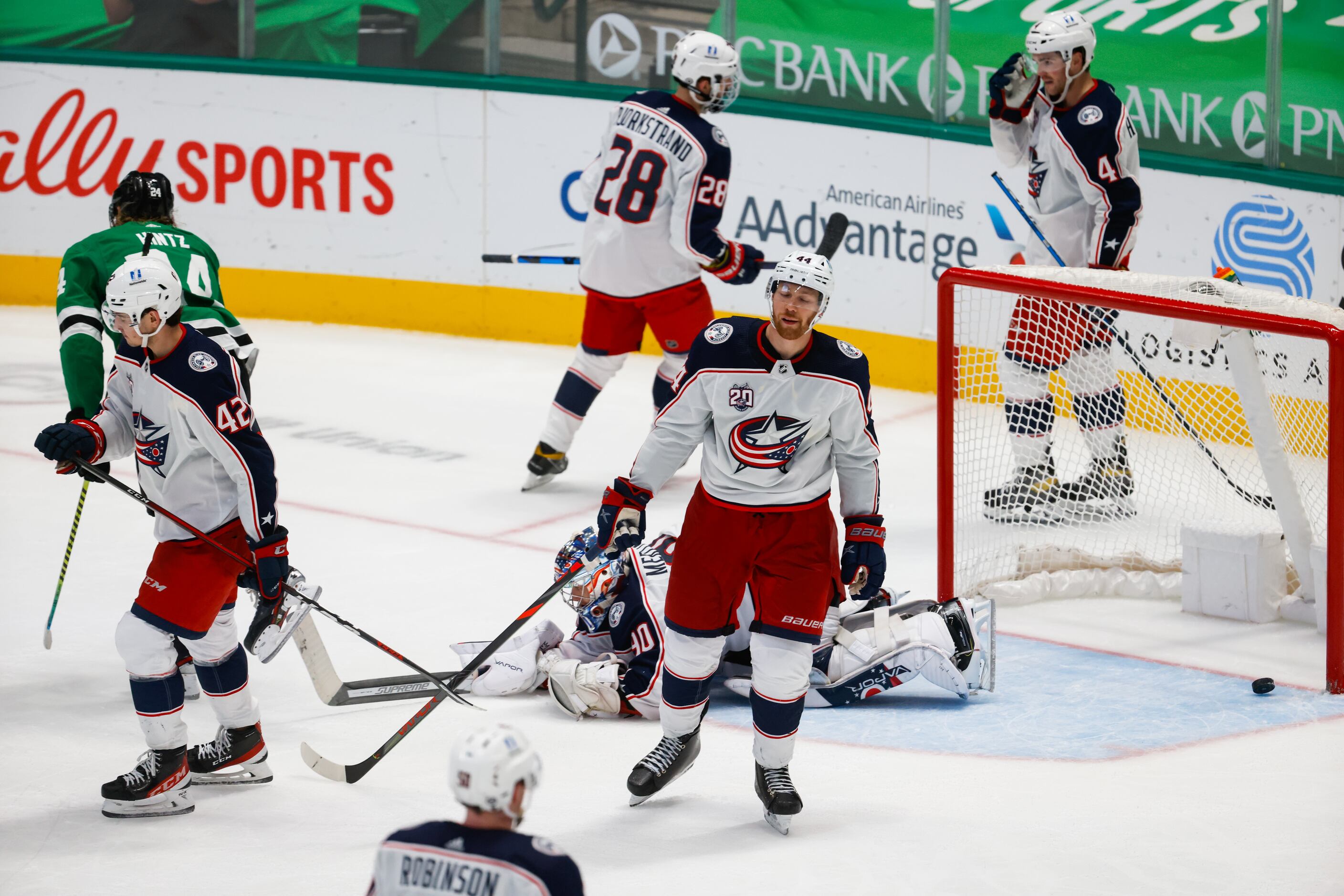 Columbus Blue Jackets players react to Dallas Stars center Joe Pavelski (16) goal in the...