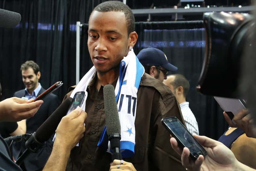 New Dallas Mavericks player Monta Ellis talks with the media at a press conference at the...