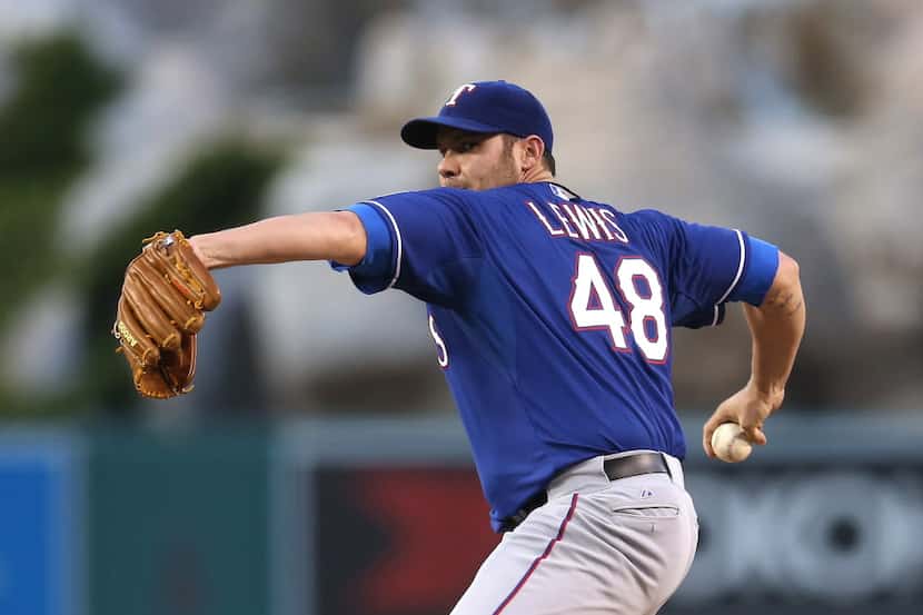 ANAHEIM, CA - MAY 02:  Colby Lewis #48 of the Texas Rangers throws a pitch against the Los...