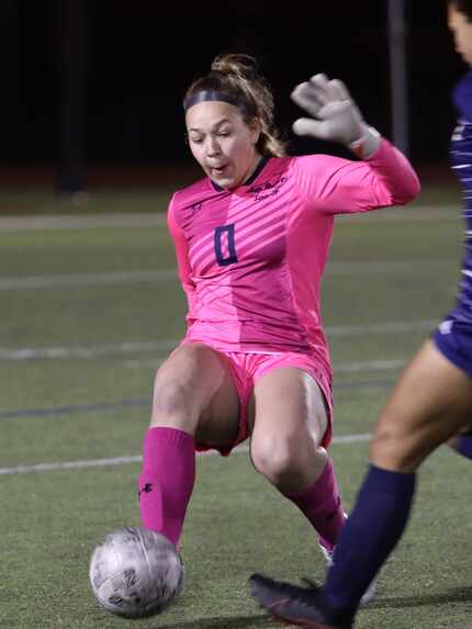 Wylie East High School player #0, Breanna Wooten, defends the goal from Sachse High School...