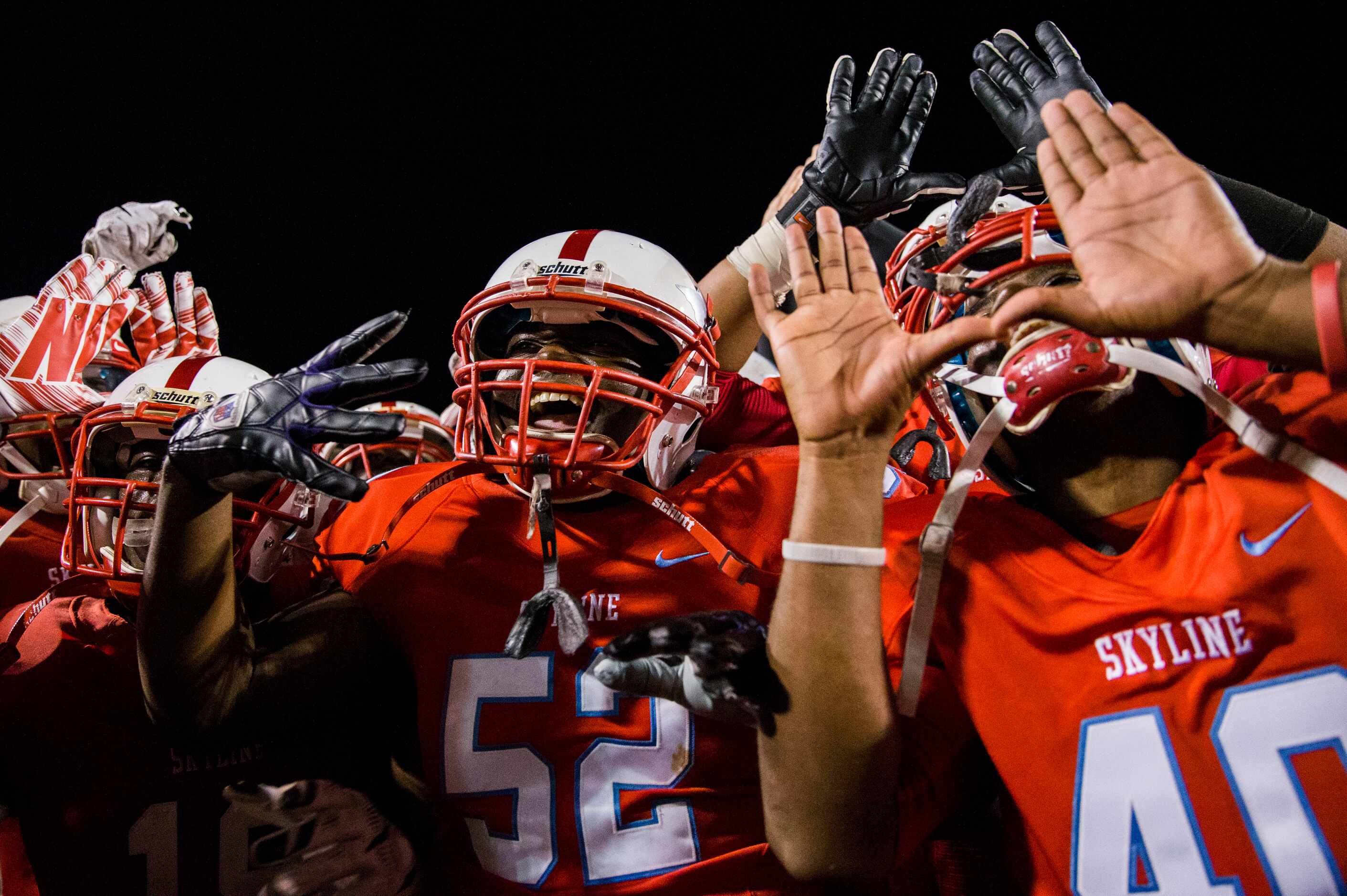Skyline celebrates a 24-22 win over Arlington Martin after their game on Friday, September...