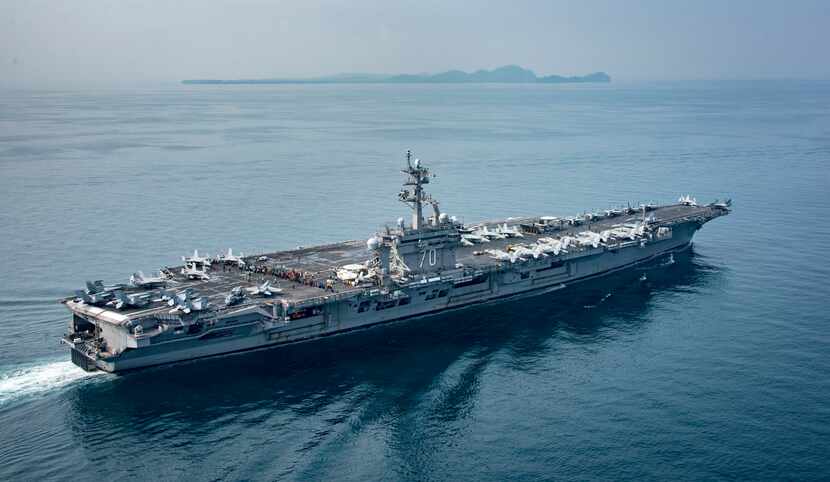 In a U.S. Navy photo, the USS Carl Vinson, an aircraft carrier, transits the Sunda Strait,...