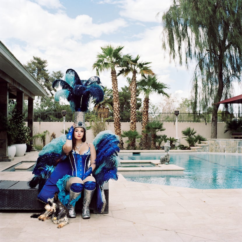 A Las Vegas performer sits poolside in Misty Keasler's Christine.