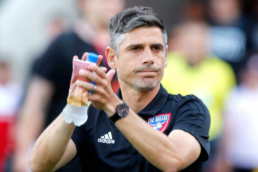 FC Dallas head coach Luchi Gonzalez enters the pitch before the match as FC Dallas hosted...