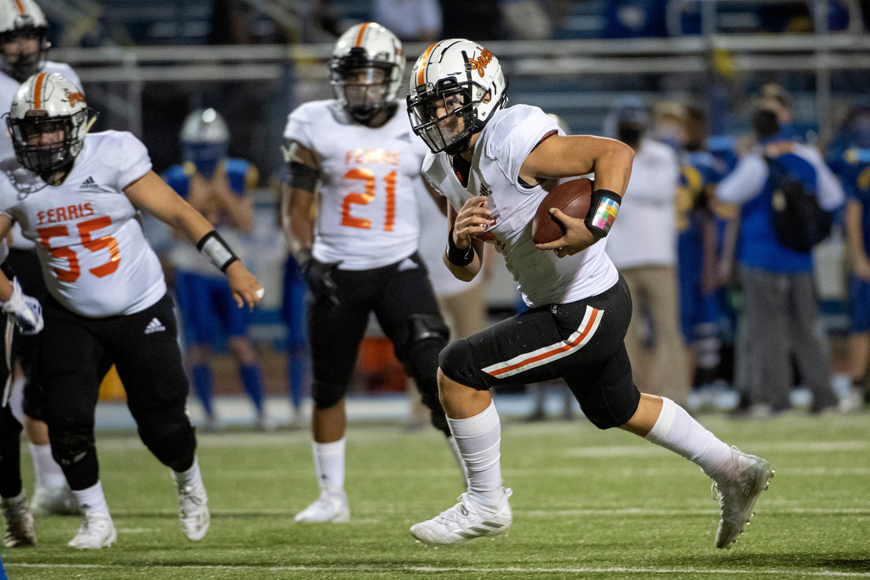 Ferris senior quarterback Nate Aguinaga (7) runs upfield against Sunnyvale in the second...