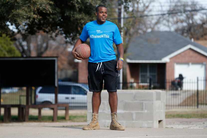 Xavier Briscoe plays basketball with other classmates at Cornerstone Crossroads Academy in...