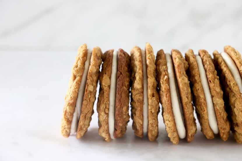 Homemade Oatmeal Cream Pies sandwich soft, chewy cookies around fluffy marshmallow buttercream.