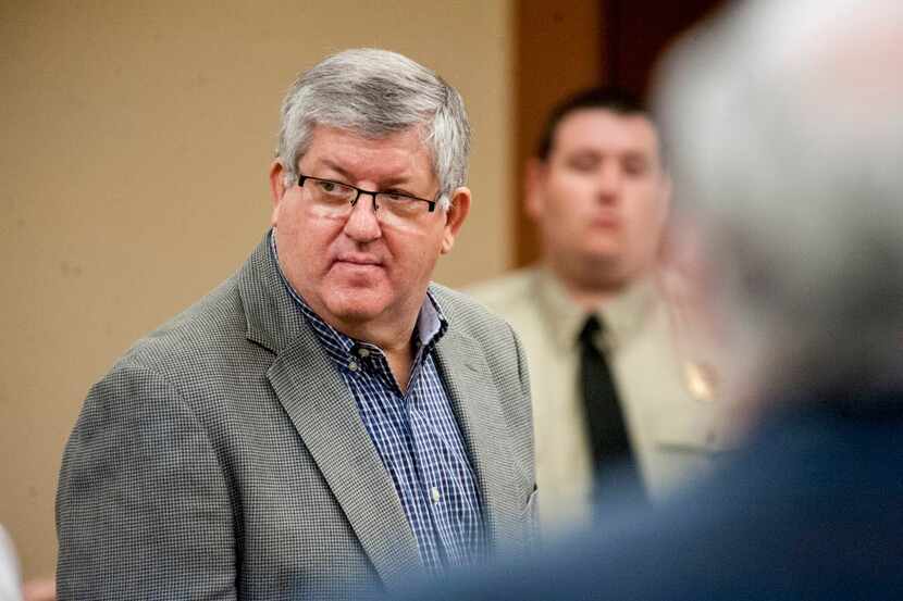  Bernie Tiede (left) stood in court this week at the Rusk County Justice Center in...