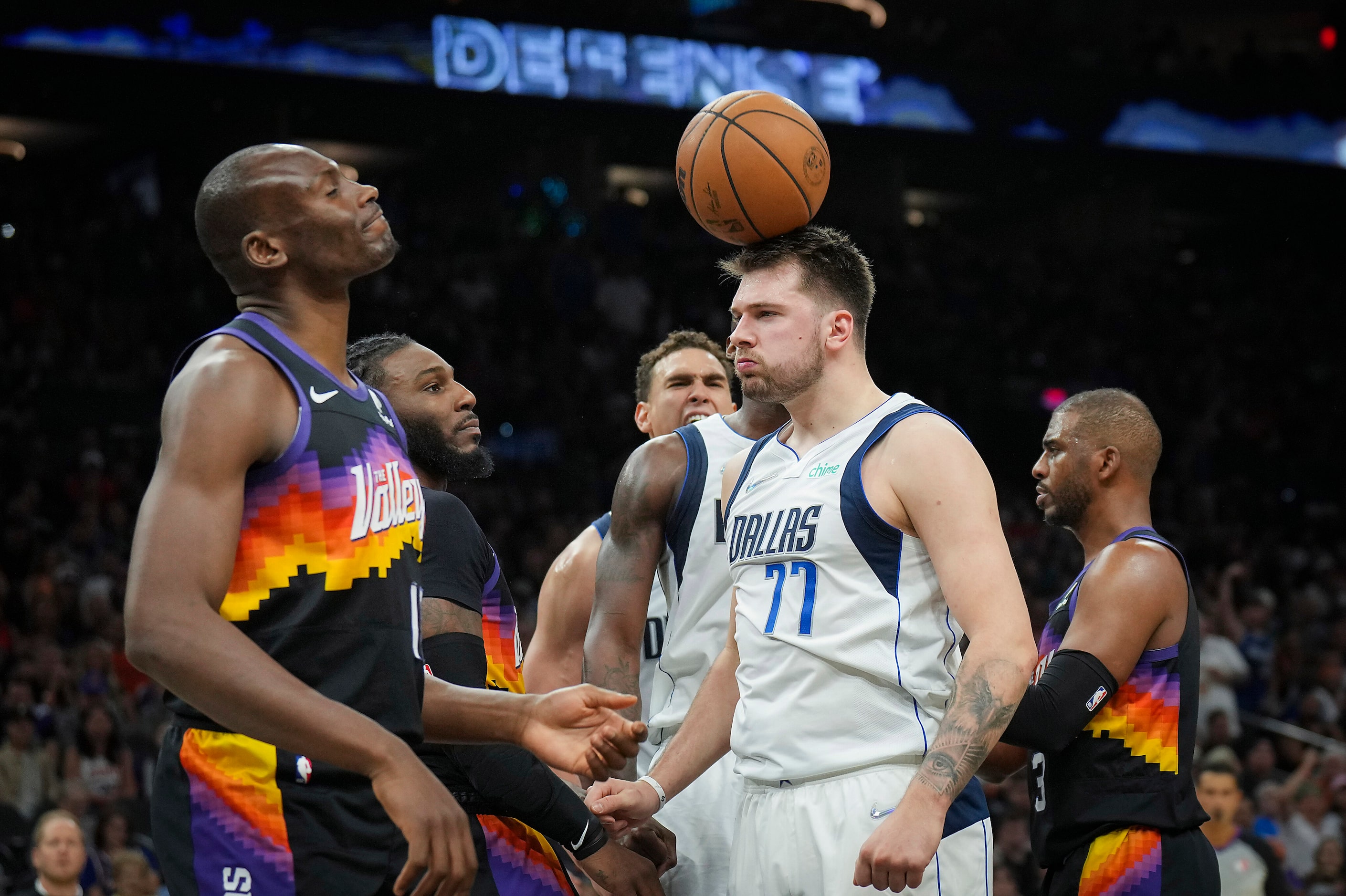 Dallas Mavericks guard Luka Doncic (77) celebrates after being fouled by Phoenix Suns center...