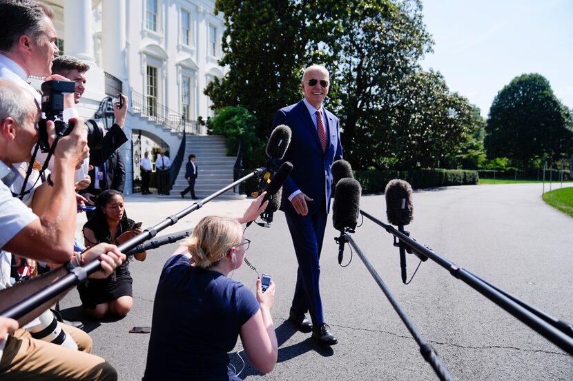 President Joe Biden speaks to reporters before boarding Marine One on the South Lawn of the...