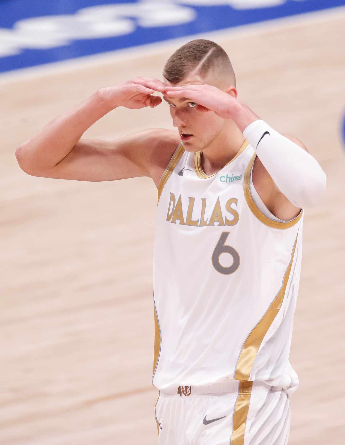 Dallas Mavericks forward Kristaps Porzingis (6) celebrates a three-point buzzer beater at...