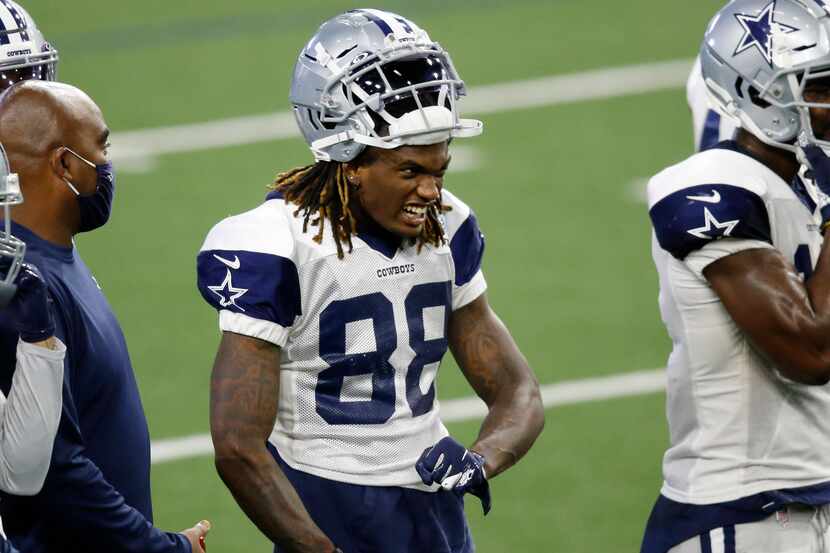 Dallas Cowboys wide receiver CeeDee Lamb (88) makes a face in practice during training camp...