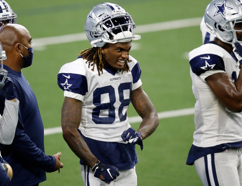 Dallas Cowboys wide receiver CeeDee Lamb (88) makes a face in practice during training camp...