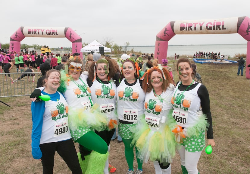 Women competing in the Dirty Girl Mud Run at Cedar Hill State Park on Saturday, Oct. 6,...