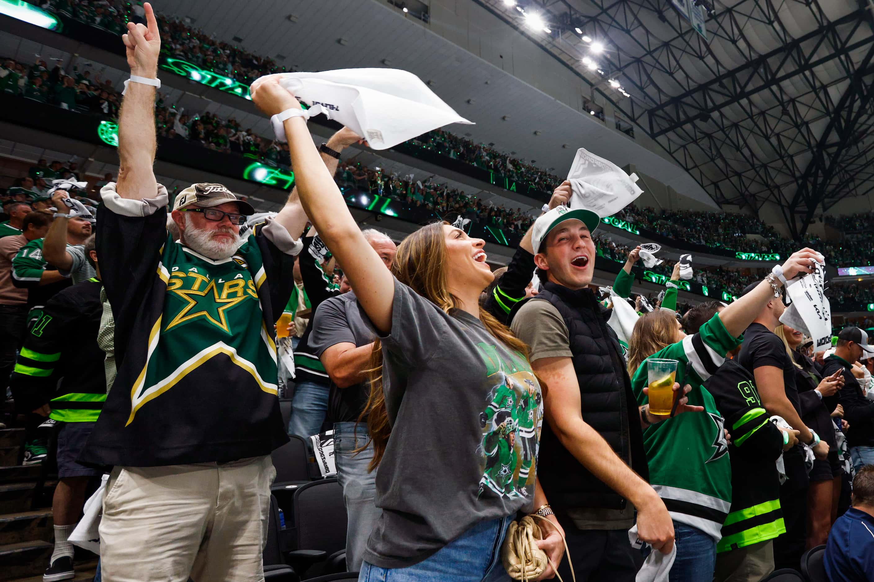 Dallas Stars fans celebrate a goal by left wing Jamie Benn during the first period of Game 2...