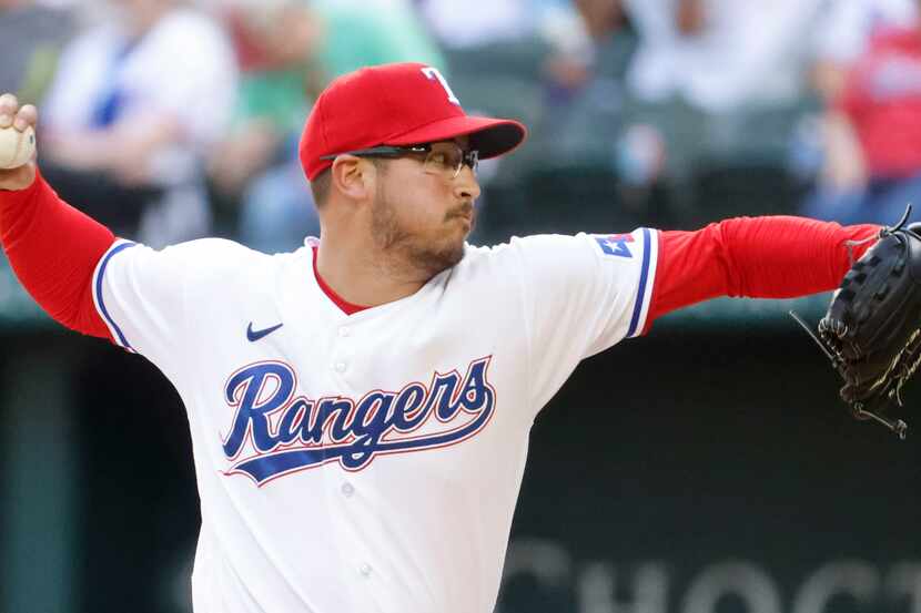 Texas Rangers starting pitcher Dane Dunning during the seventh inning of a baseball game...