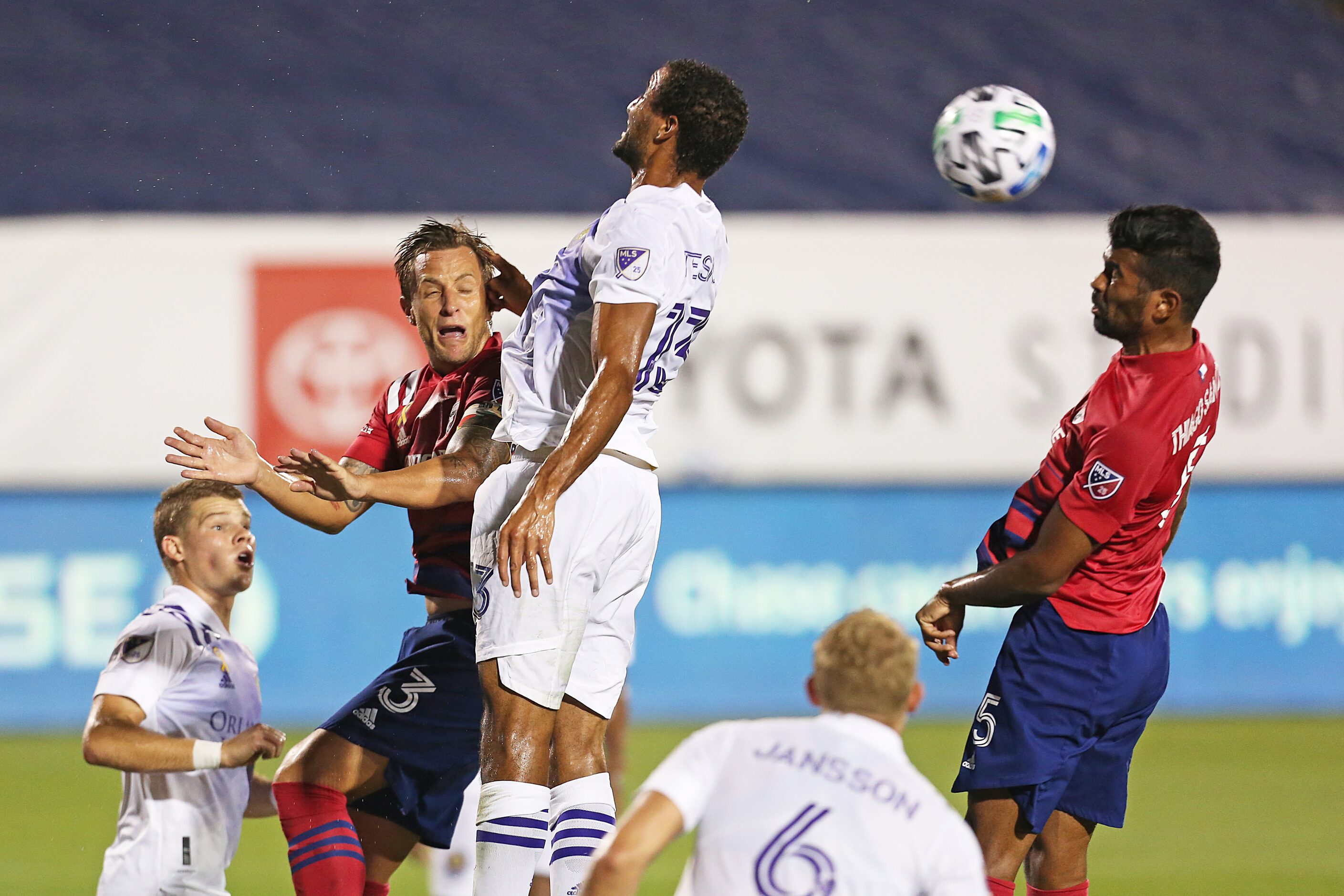 FRISCO, TX - SEPTEMBER 27: Captain Reto Ziegler #3 and Thiago Santos #5 of FC Dallas head...