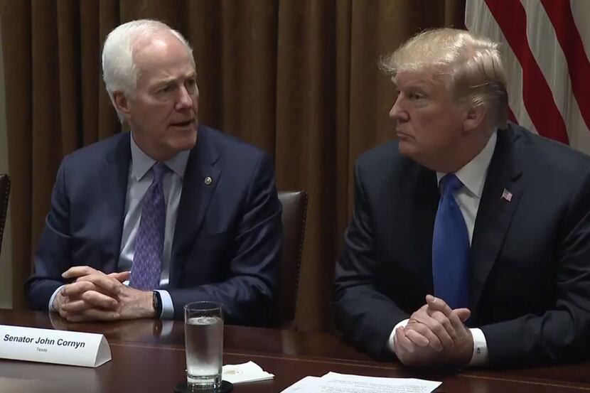 Texas Sen. John Cornyn with President Donald Trump at a White House meeting on school safety...