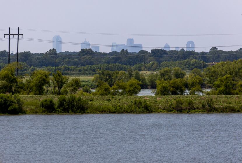 The downtown Dallas skyline is visible from the levee at Dallas Water Utilities' Southside...