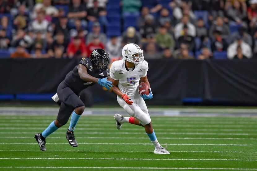 Wide receiver Bru McCoy (5) runs the ball during the All-American Bowl in January at the...