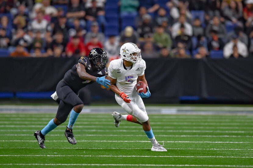 SAN ANTONIO, TX - JANUARY 05: Wide receiver Bru McCoy (5) runs the ball during the...