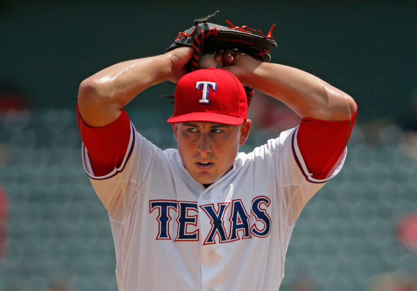 Rocking 'Wild Thing' haircut, Derek Holland throws first shutout