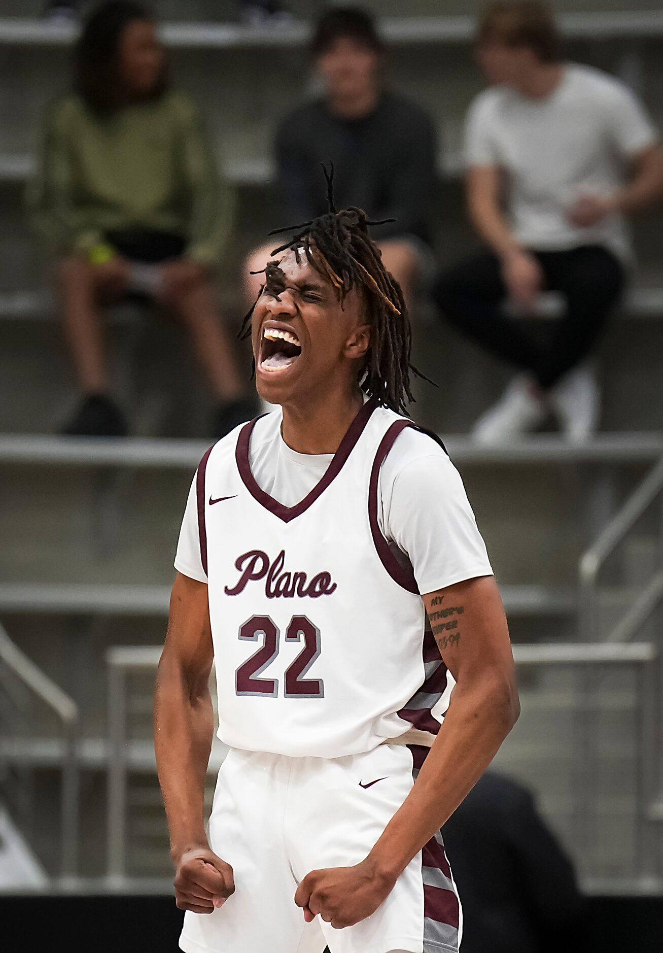 Plano forward Nikk Williams (22) celebrates after  a Denton Guyer turnover during the second...