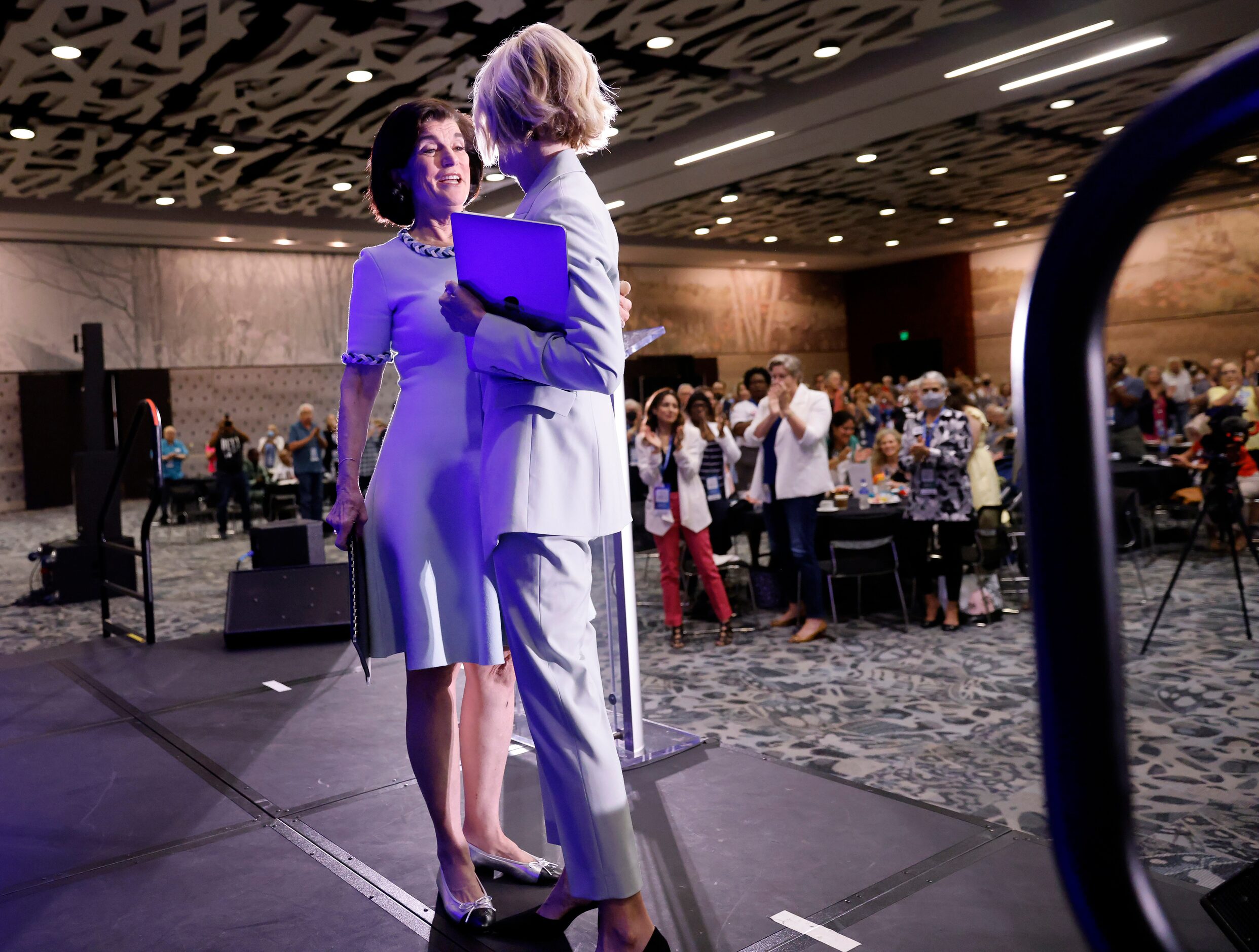 Luci Baines Johnson, daughter of President Lyndon B. Johnson (left) greets former Texas...