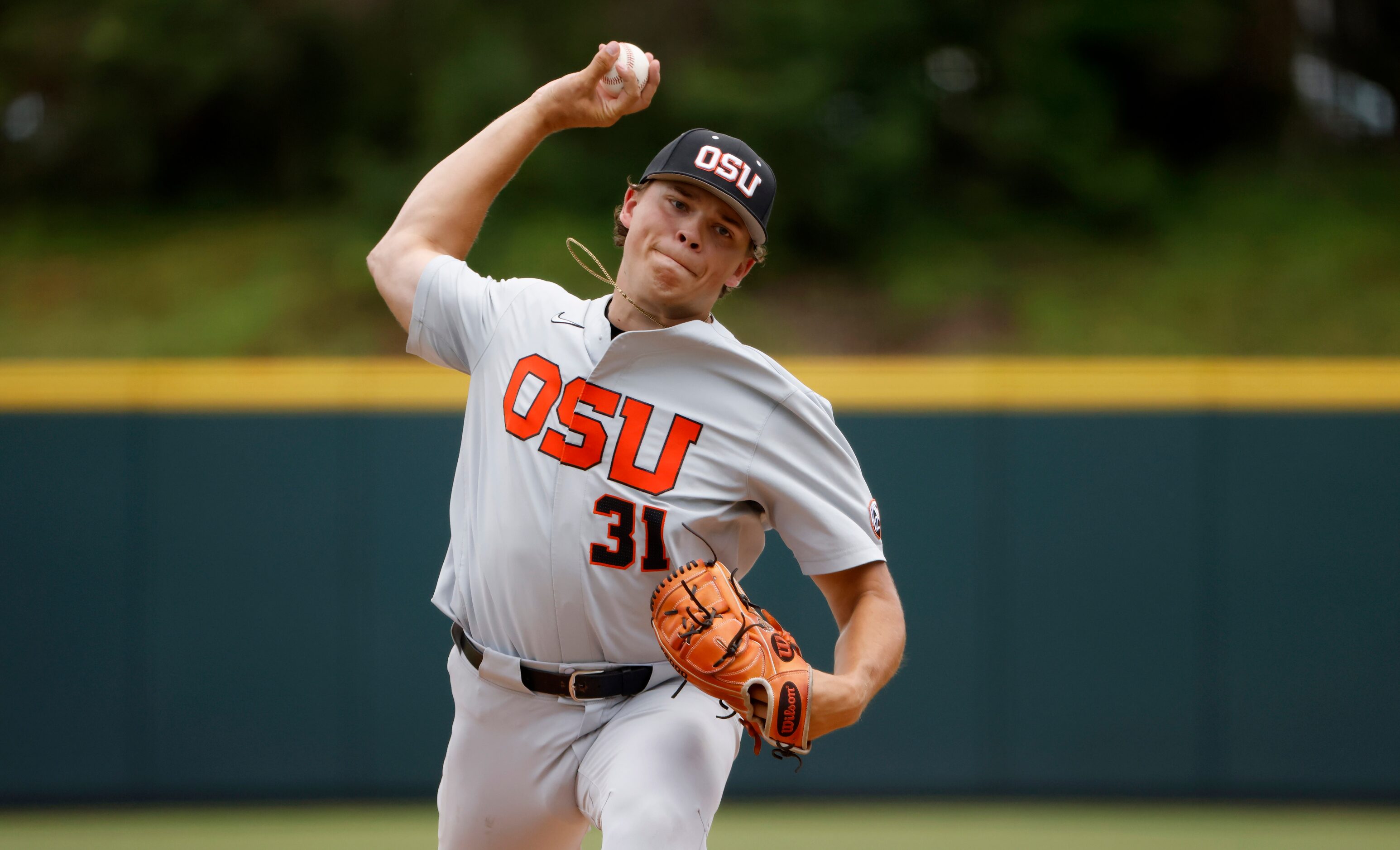 Oregon St. pitcher Jack Washburn (31) delivers against Dallas Baptist in the first inning...