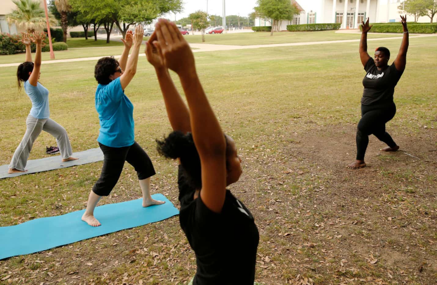 Instructor Ebony Smith leads a Yoga N Da Hood class at Fair Park in Dallas.