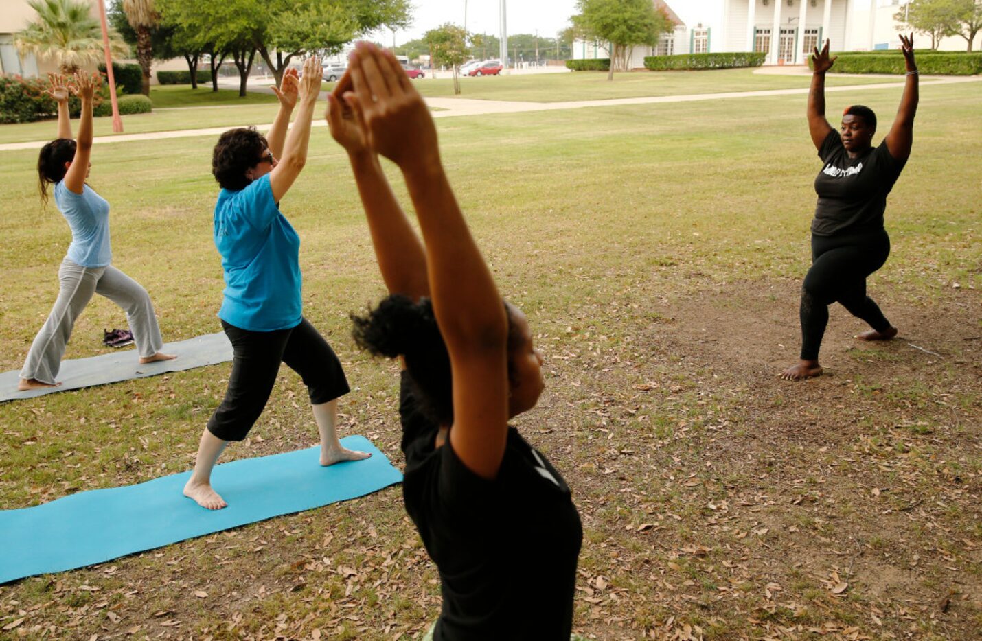 Instructor Ebony Smith leads a Yoga N Da Hood class at Fair Park in Dallas.